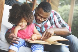 Father reading with child