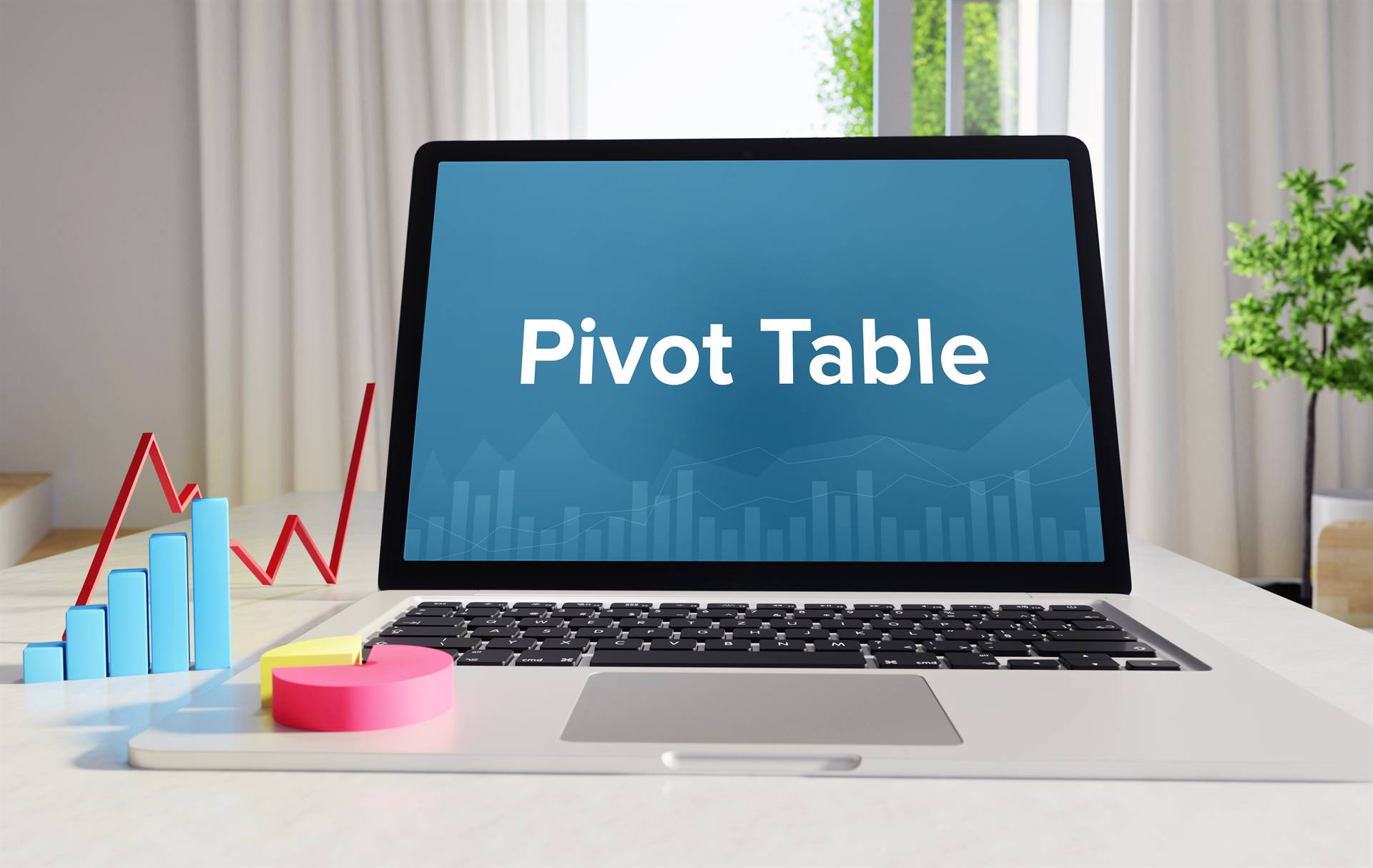 laptop with the words pivot table displayed