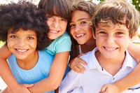 Four children smiling