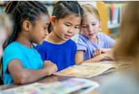 three female children reading book